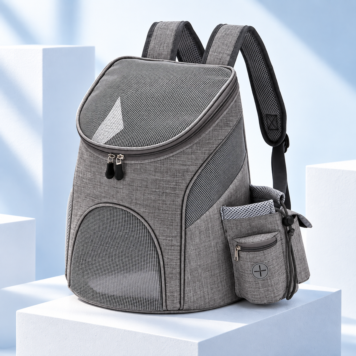 Foldable mesh pet carrier backpack in grey, studio photo