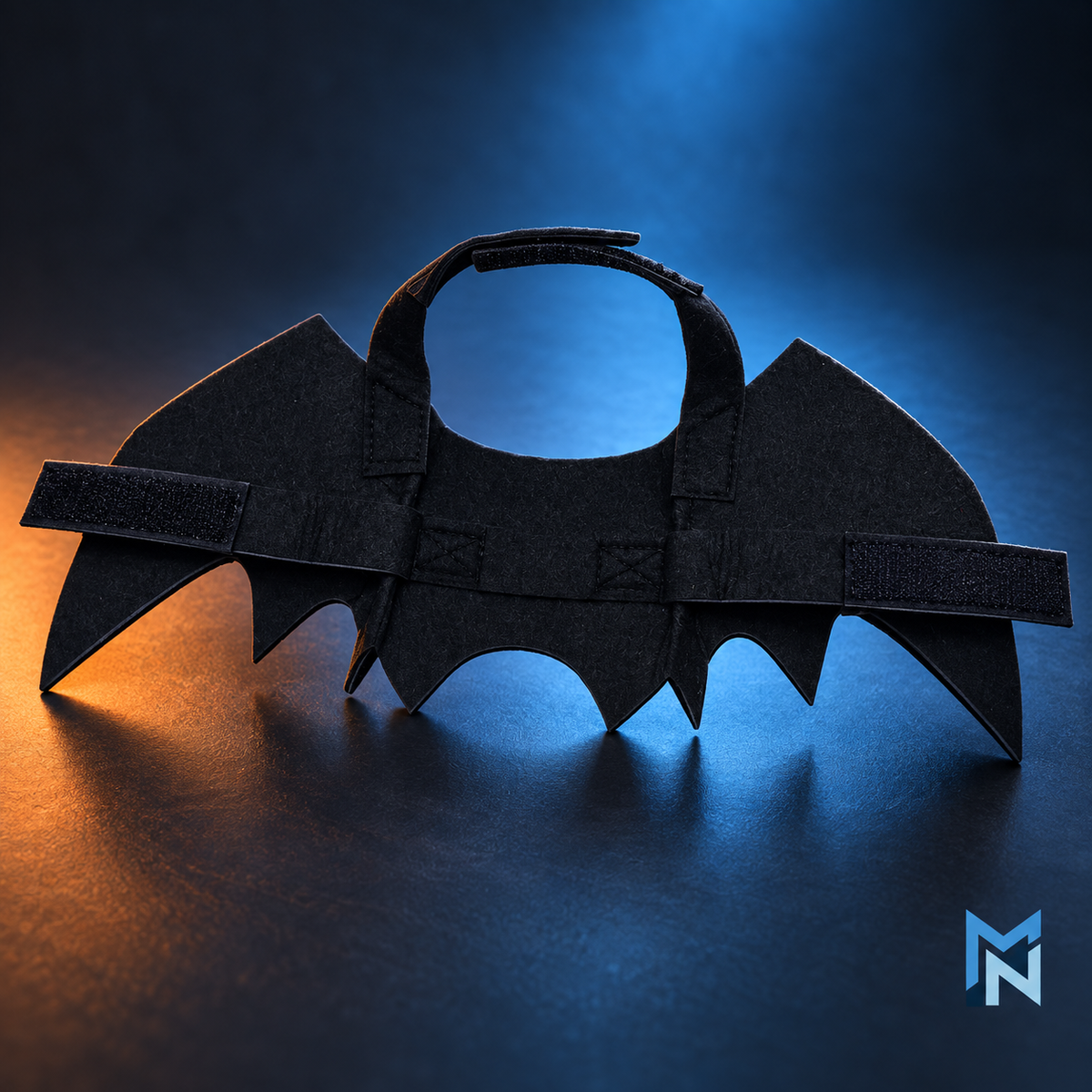 Detail view of the Bat Wing Pet Costume straps and felt material