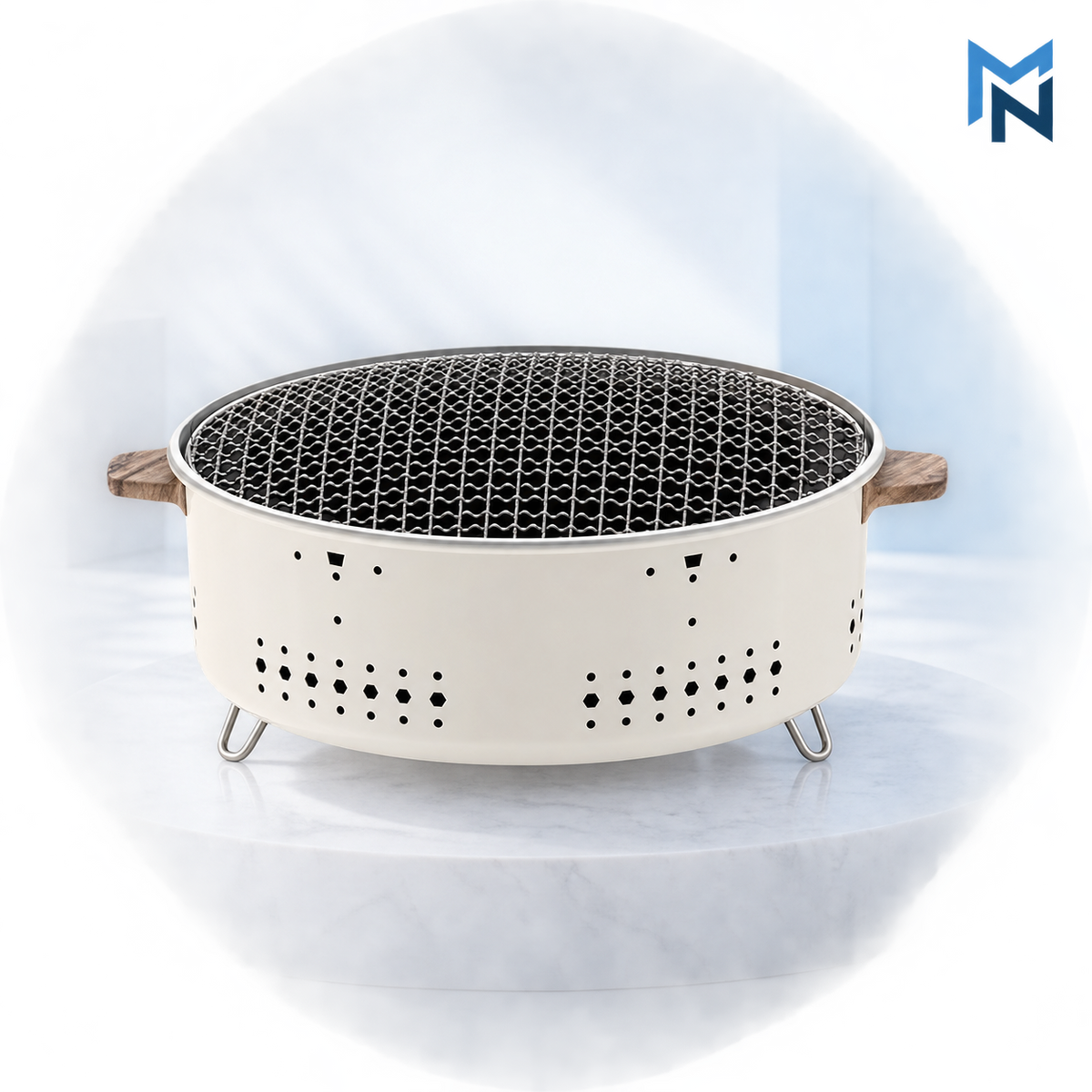 Round outdoor charcoal grill, studio shot