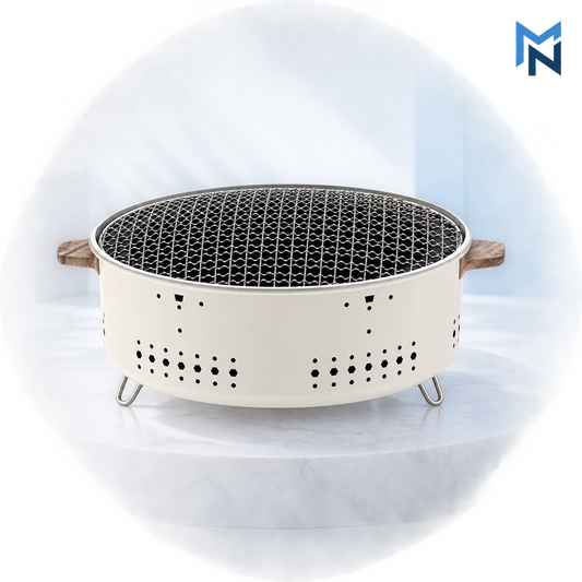 Round outdoor charcoal grill, studio shot